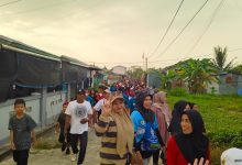 Peserta mengikuti Jalan Santai Pesta Rakyat Juara Vol. 4 di RT 02 Juata Permai, Tarakan, Minggu (6/9/2026).